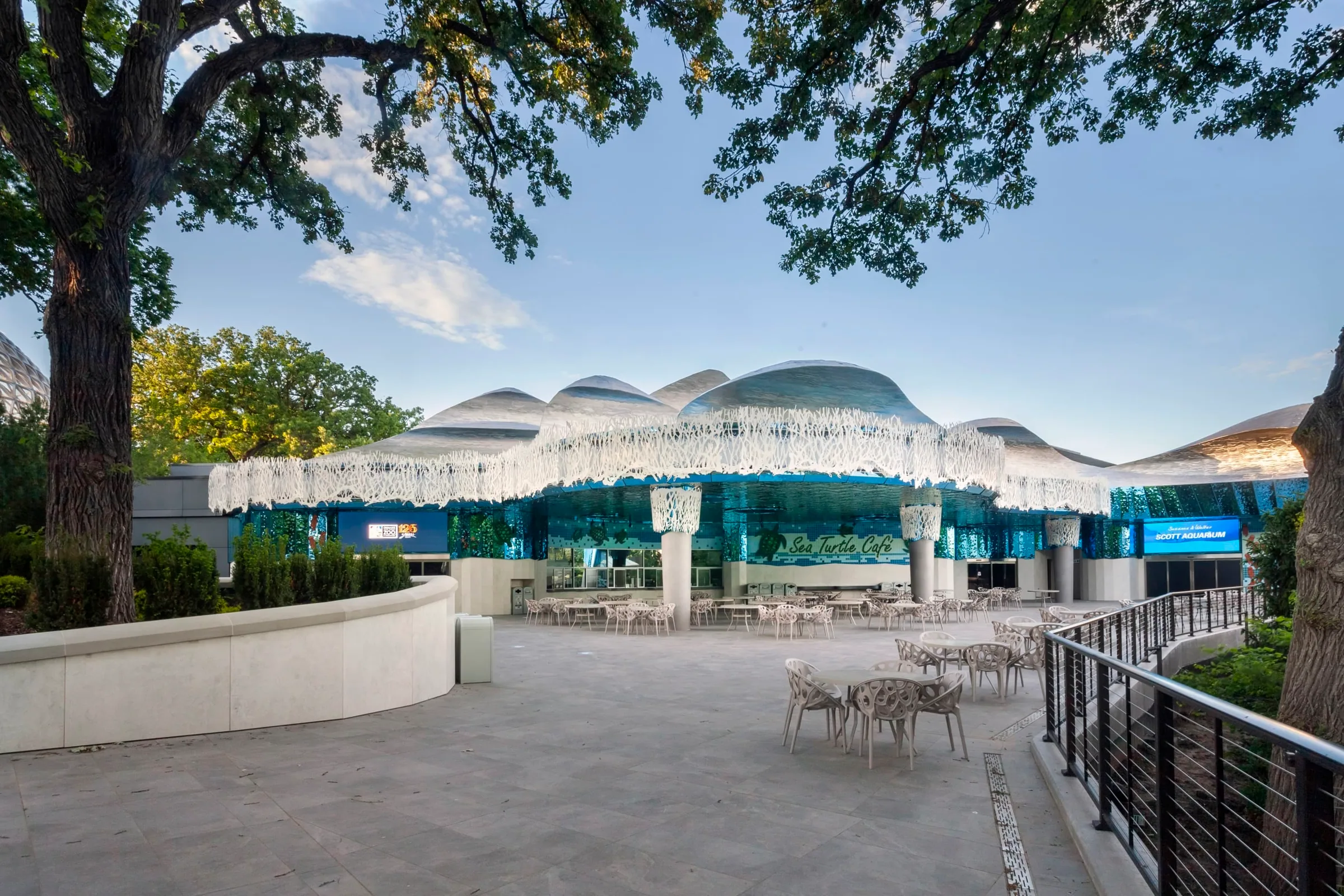 Cafe tables under the long wave canopy