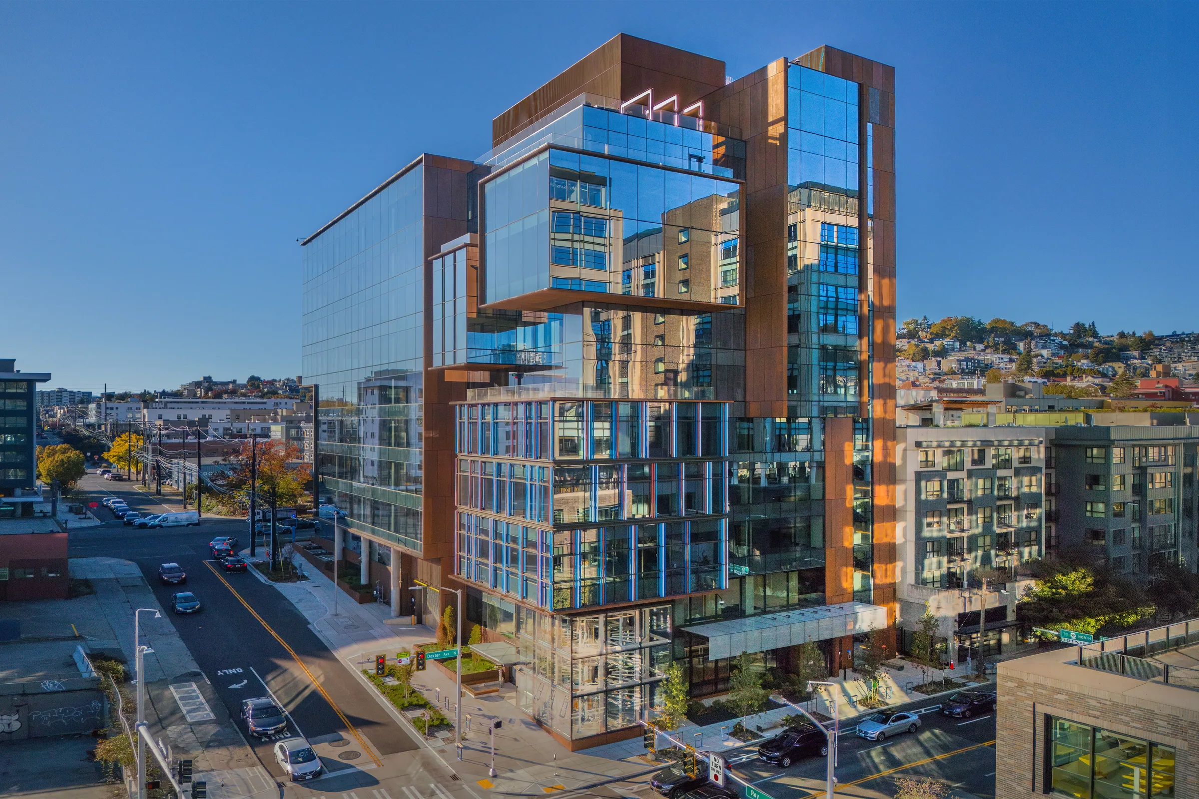 From above: the glass and steel tower at the corner of Dexter and Roy