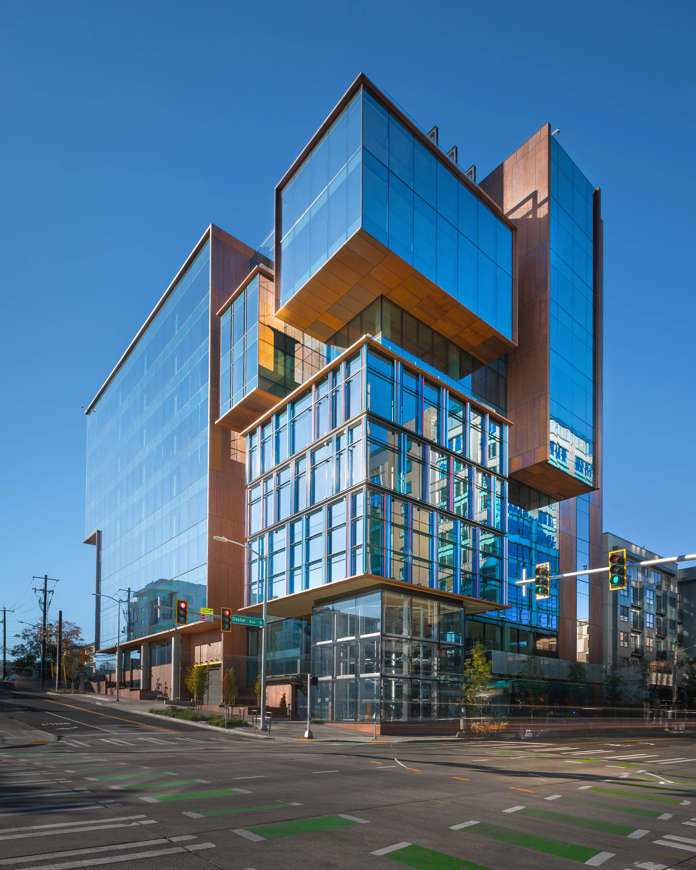 The tower’s stacked glass boxes from the street