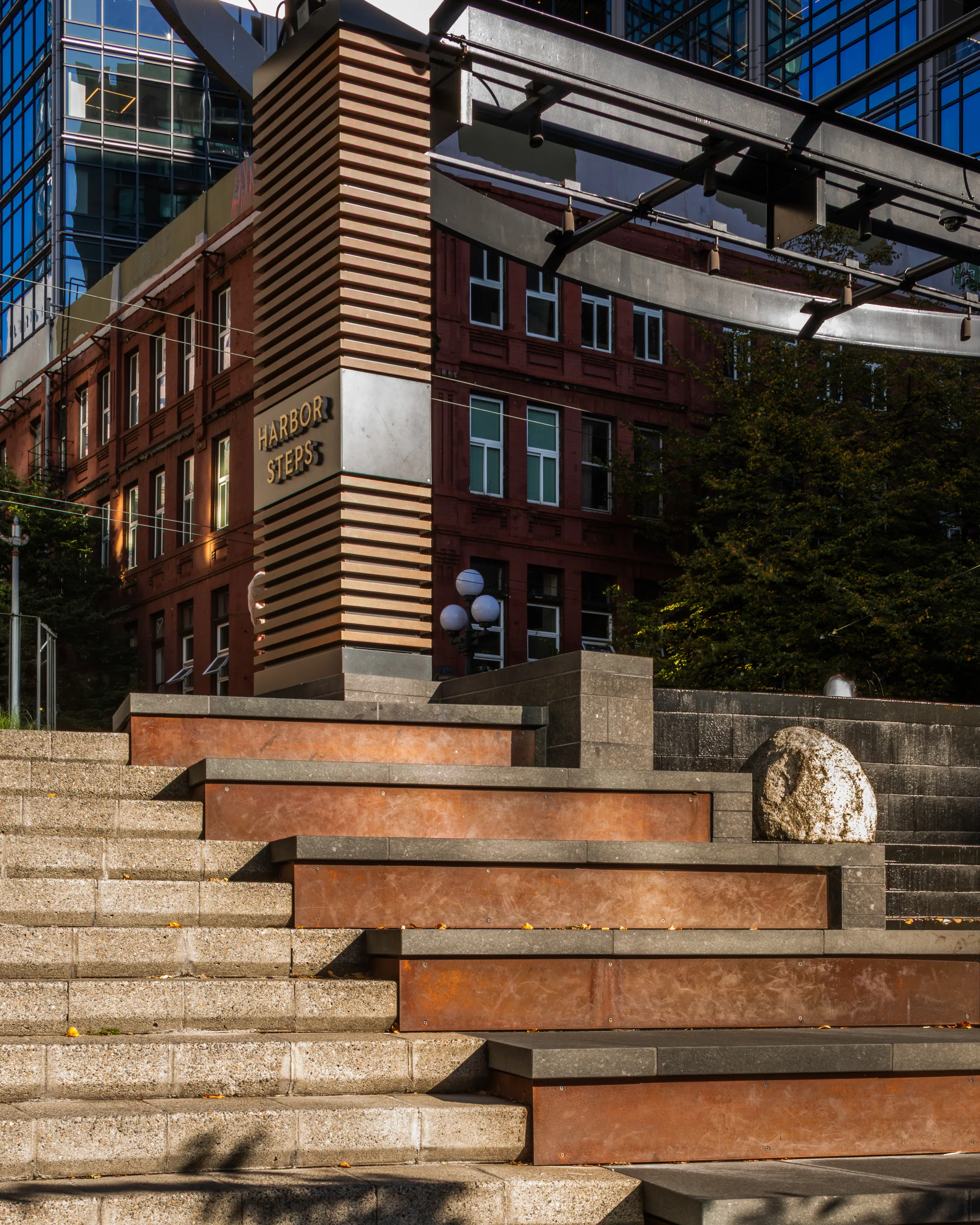 Wood and steel benches stacked up the stair