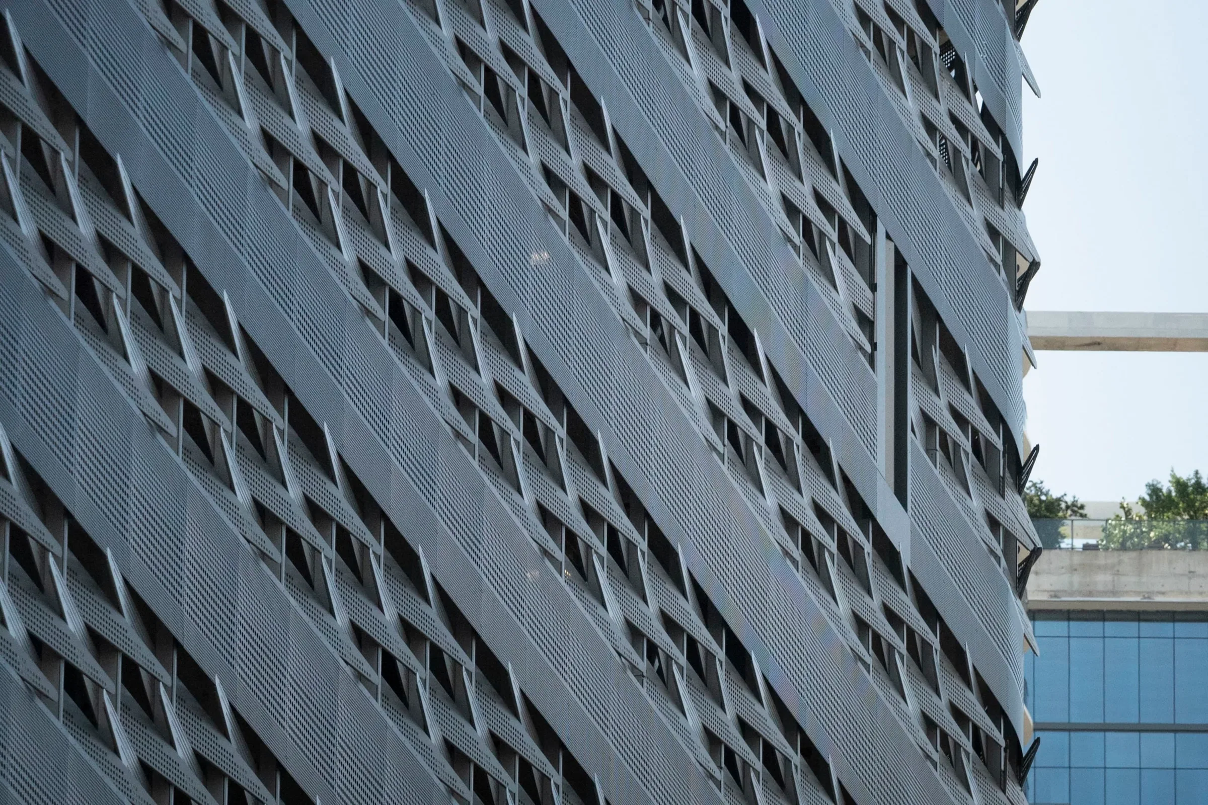 Diagonal rows of folded panels across the garage