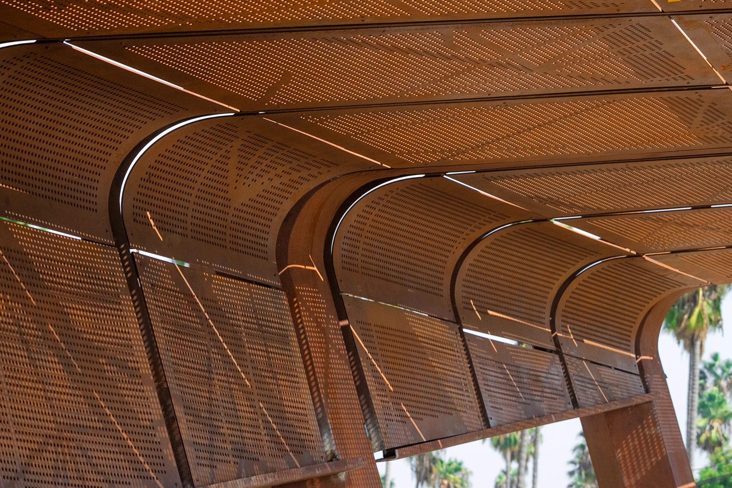 The canopy's curved perforated edge from below