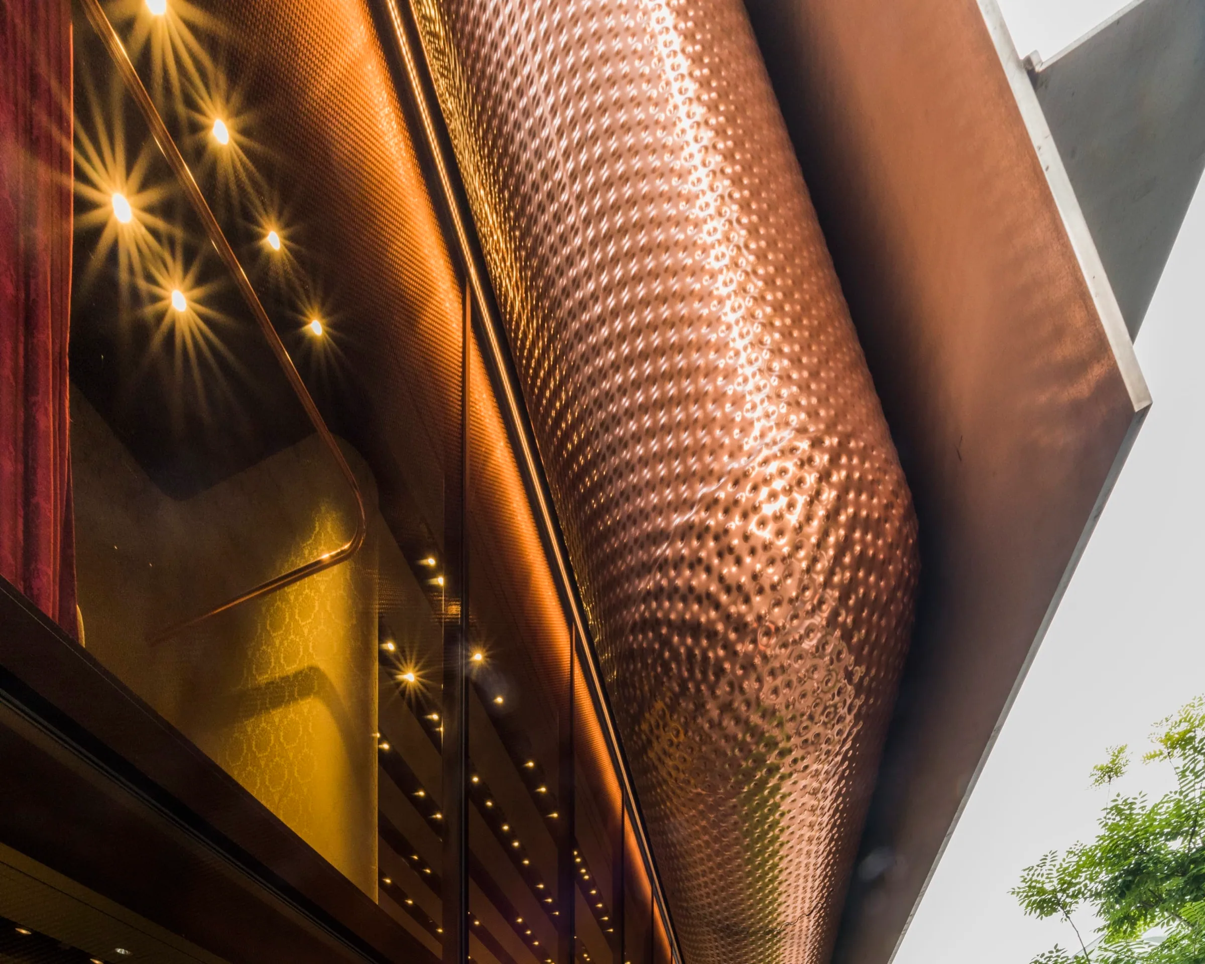 Dimpled copper and pinpoint lights inside the fold