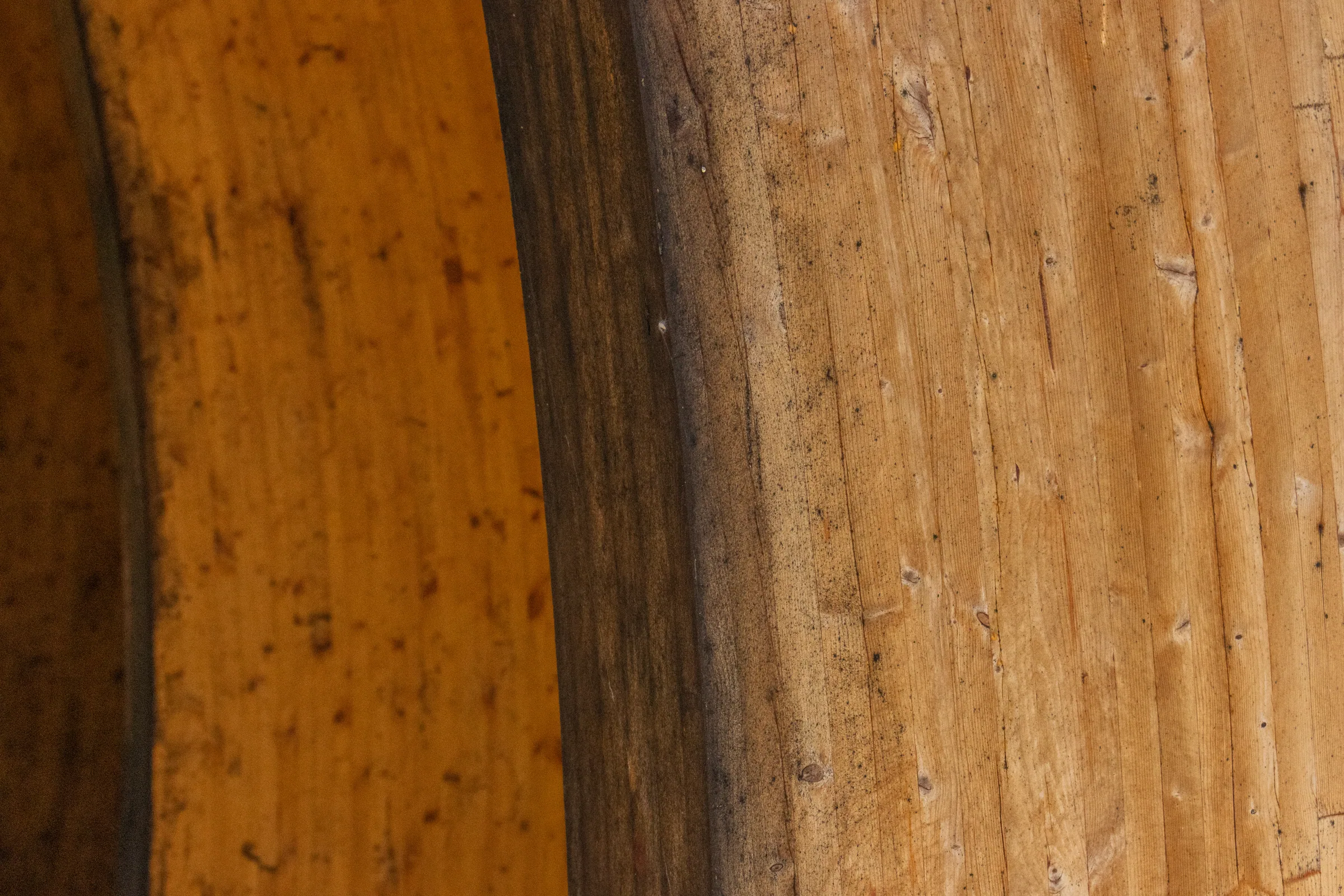 Close on a glulam arch and the steel skin