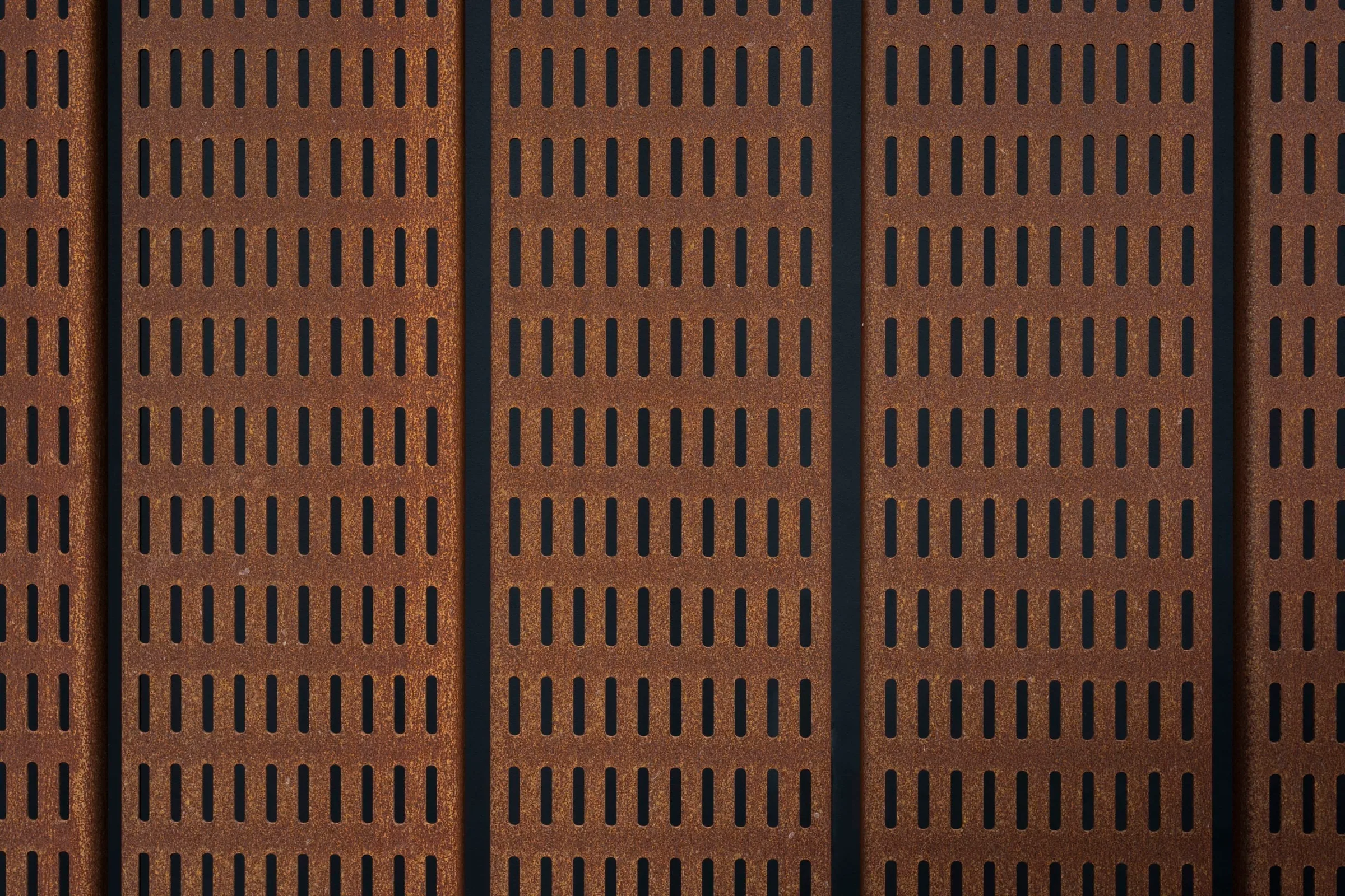 Rows of slots across the steel screen