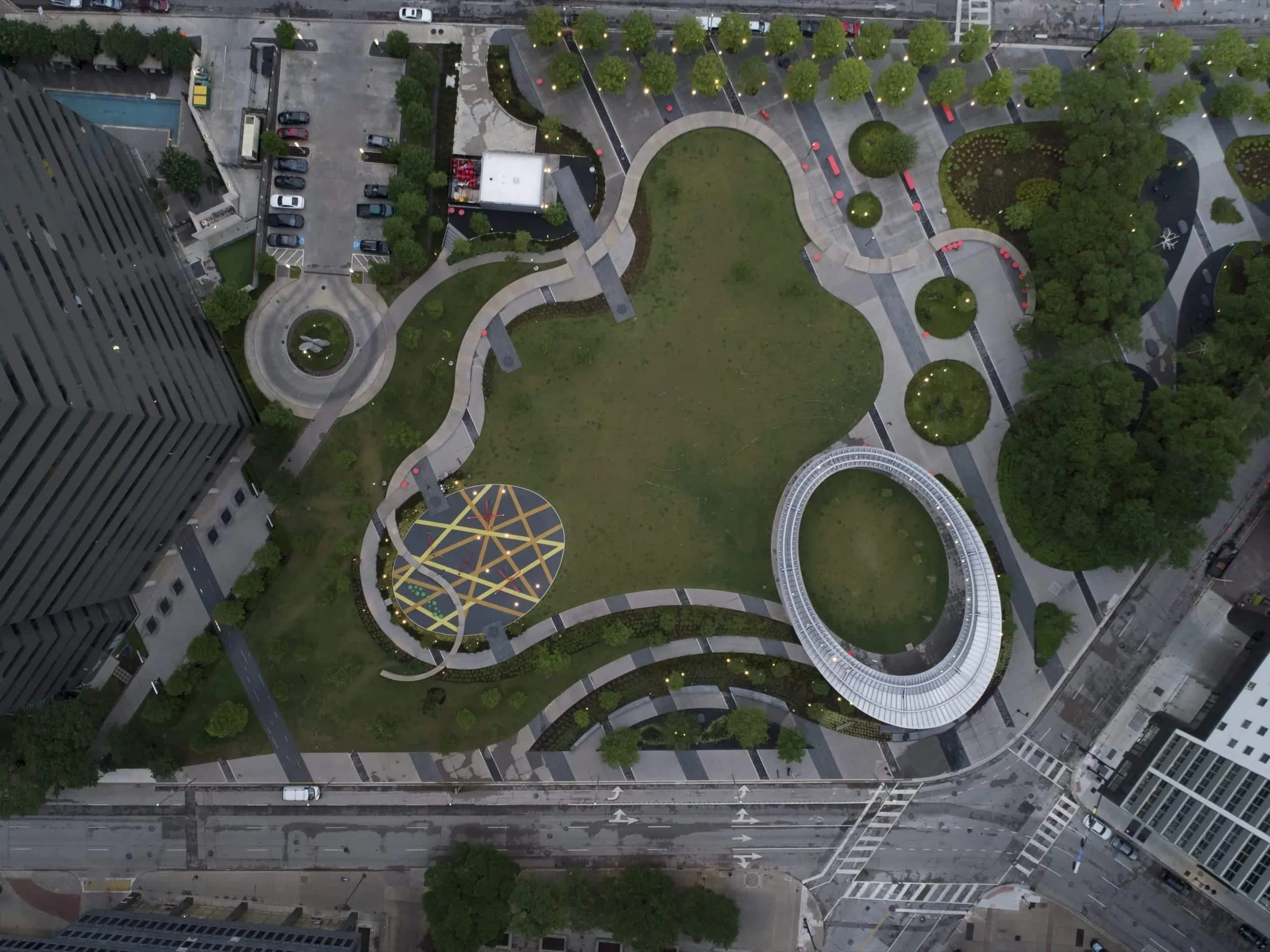 Looking straight down on the park's curving paths and the pavilion