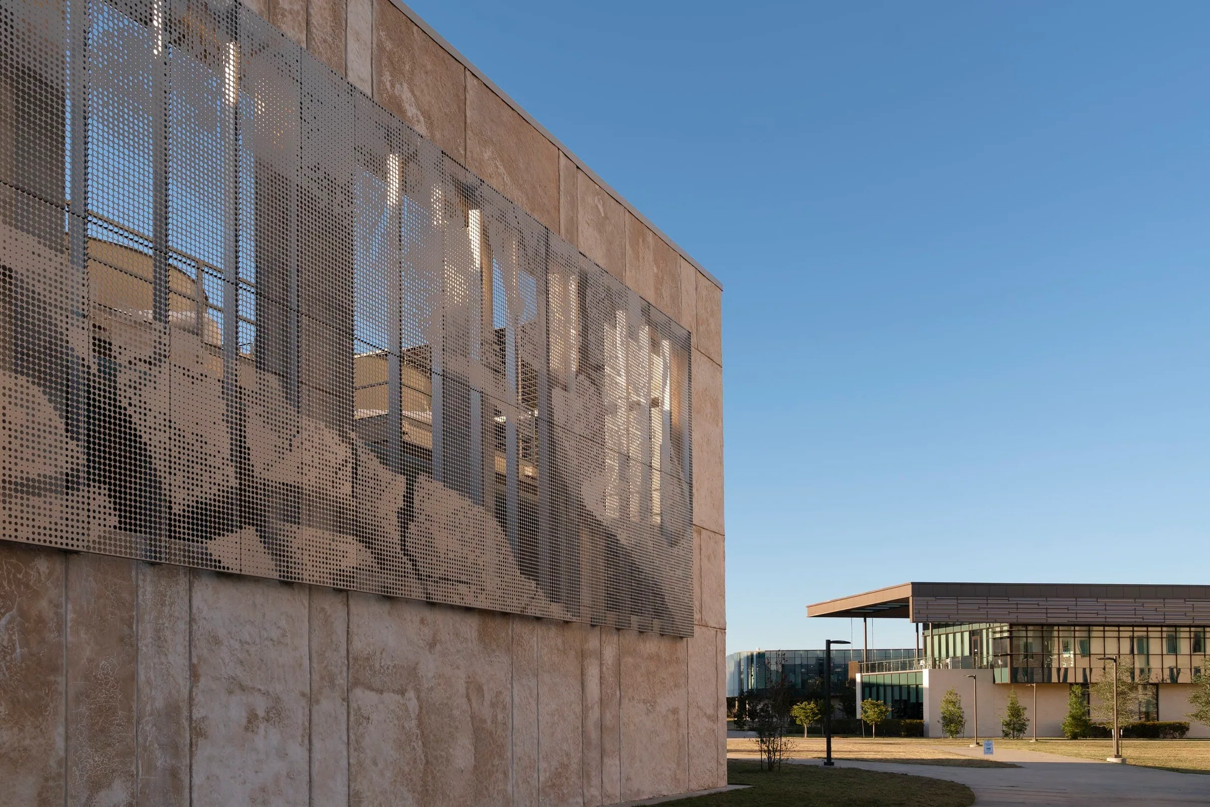 The screen along the wall, a pavilion beyond