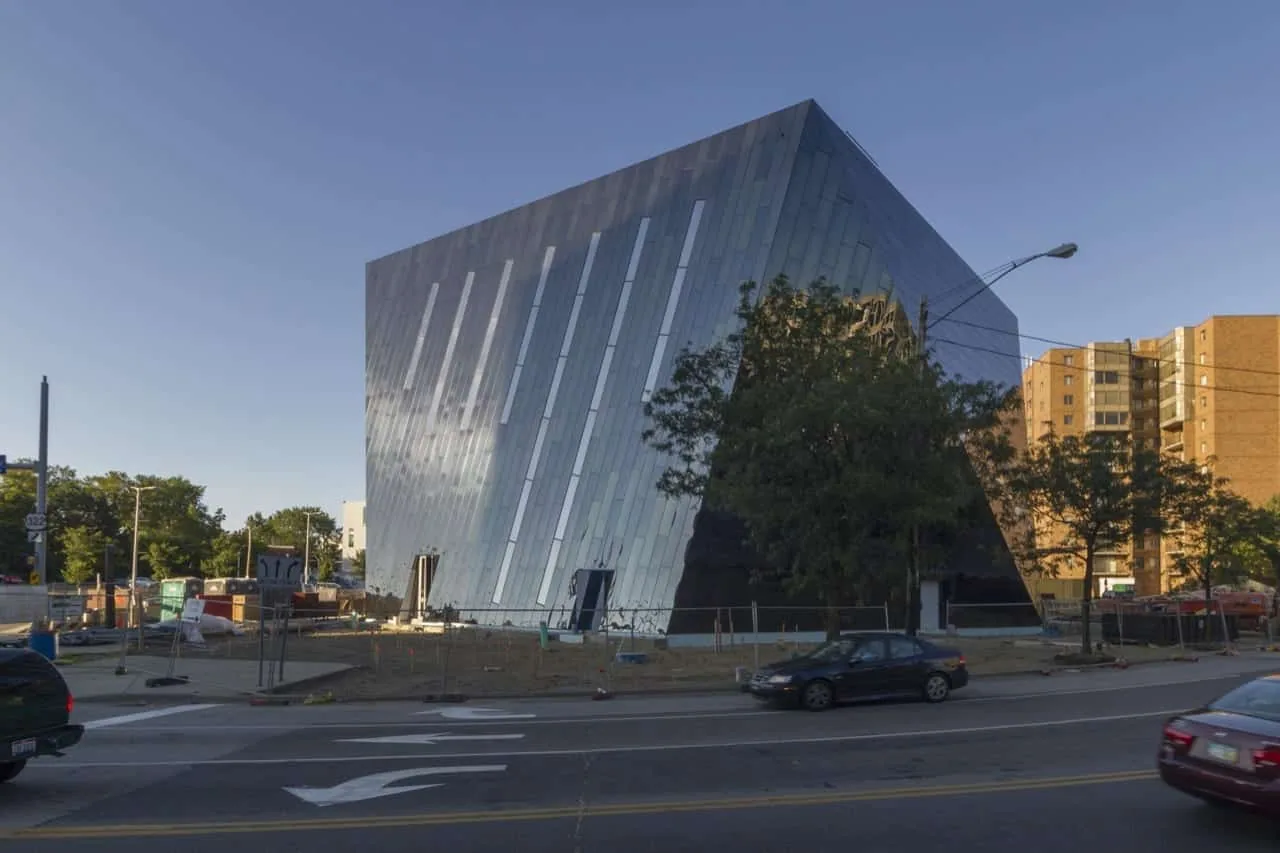 The museum’s angled walls catching the afternoon sky