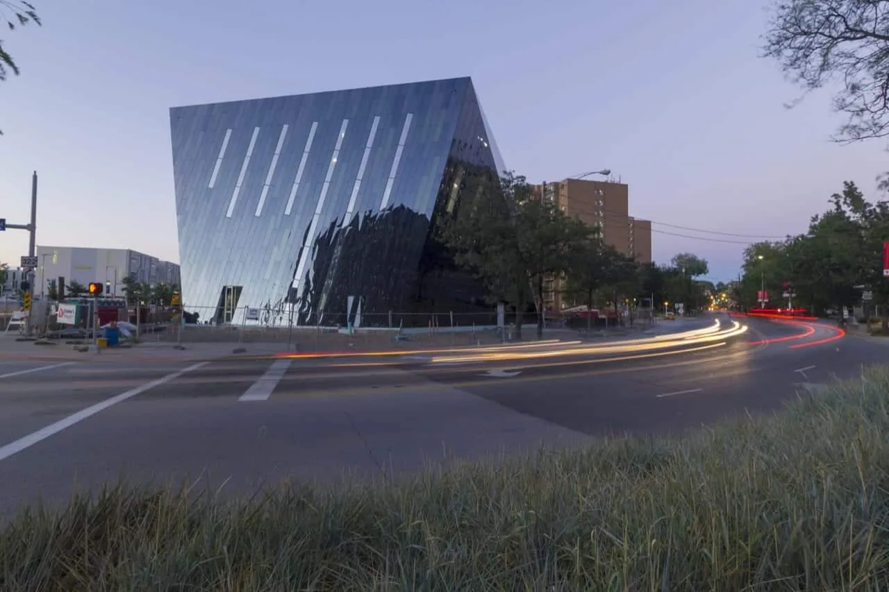 The museum at dusk beyond a busy crossing