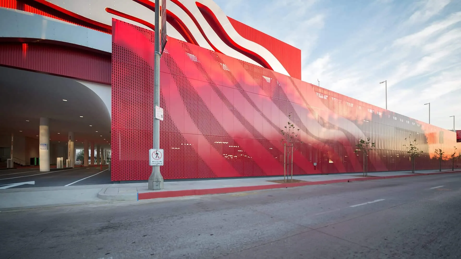 The red façade running down the block