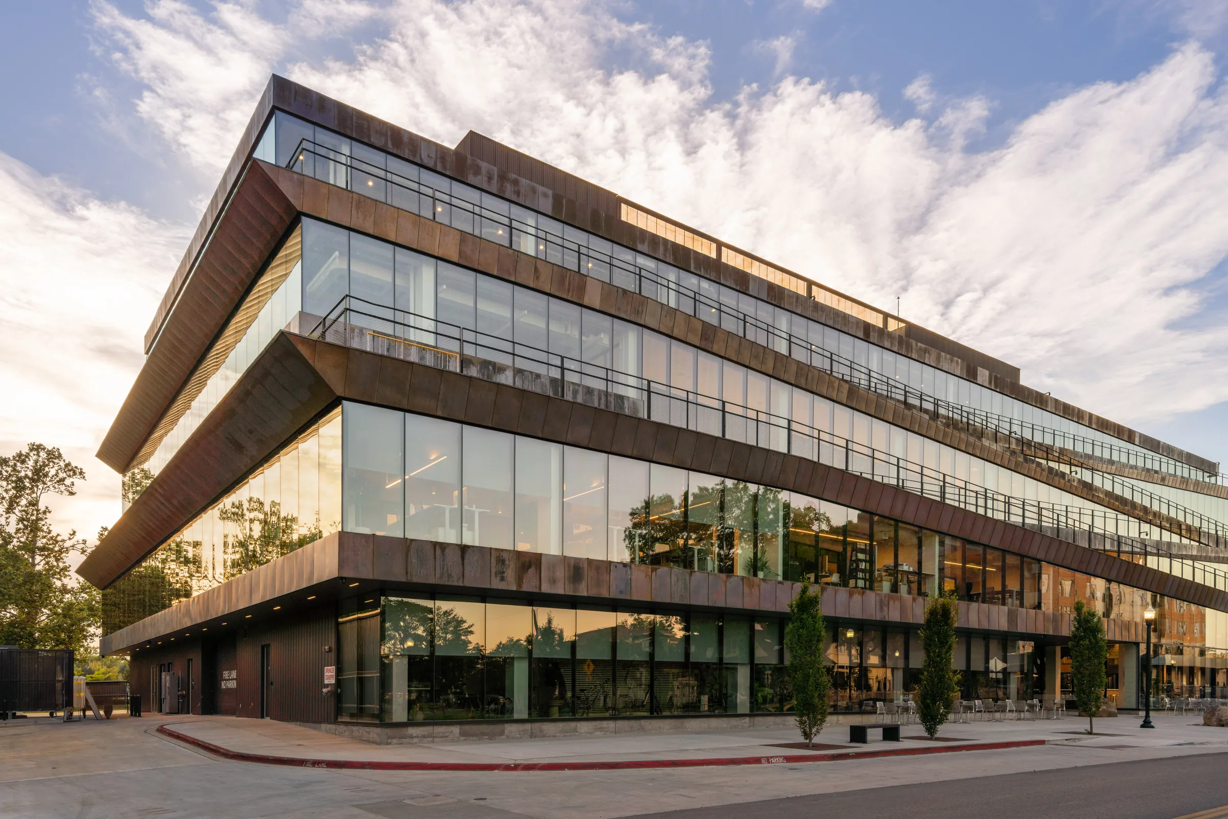 The copper-banded building under an evening sky